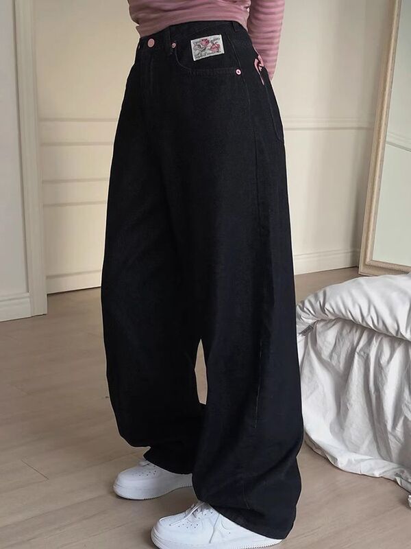 Y 2k欧米のレトロな甘いクールなギャルの潮流の高い腰はやせているズボンの刺繍のアルファベットのプリントのジーパンの女性を現します。|undefined