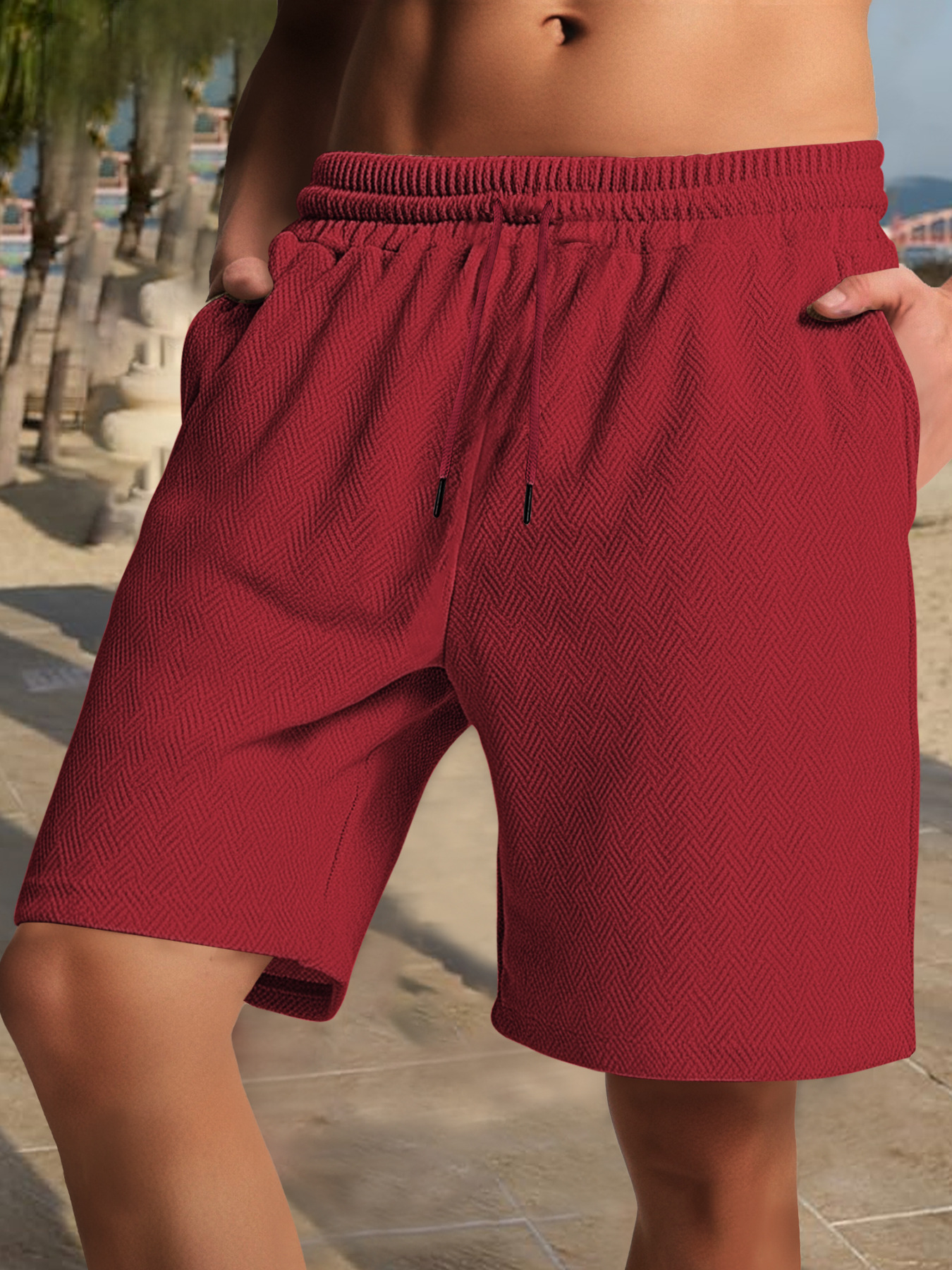 Nuevos productos transfronterizos de venta caliente Europa y Estados Unidos para hombres de verano pesado suelto simple jacquard textura línea de tendencia pantalones cortos para hombres