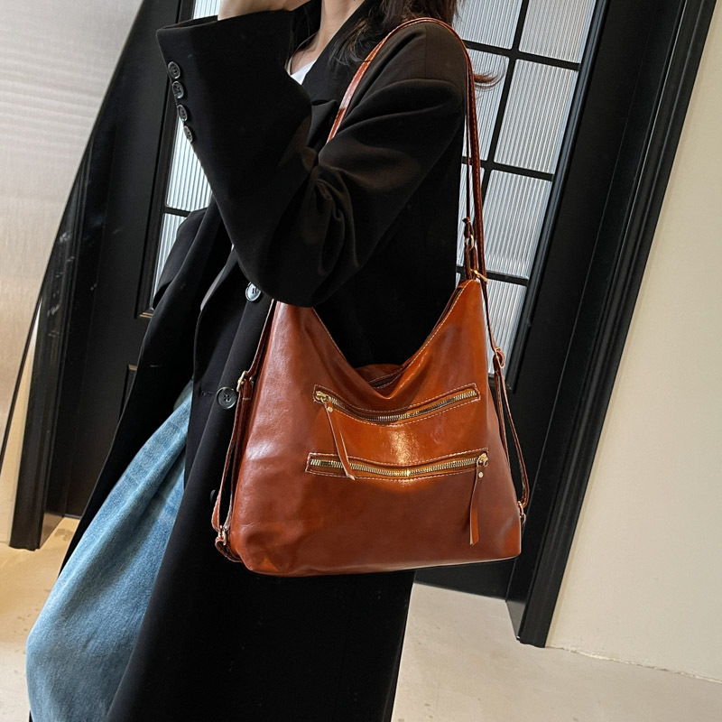 Casual viaje retro bolsos de mujer 2025 nuevo otoño invierno de alta capacidad sensación de hombro mochila bolsa