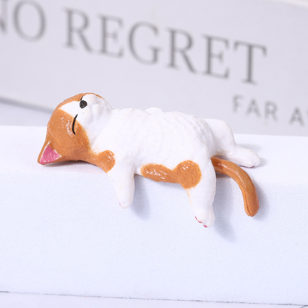1호 누워있는 주황색 고양이 2*2*4cm