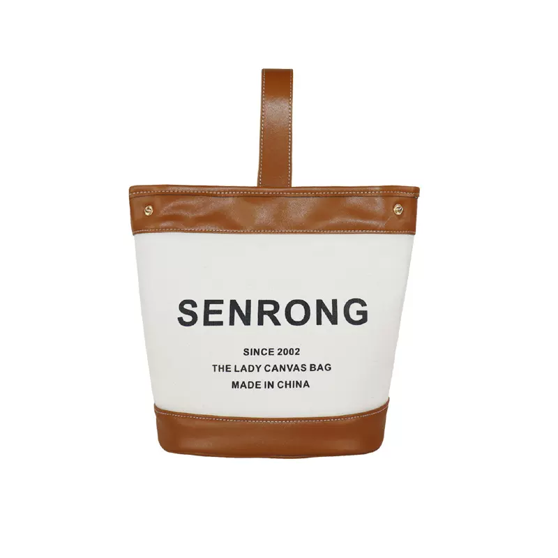 抽绳水桶包字牛皮菜手挽包 定制pu拼接手腕包 欧美复古手遛帆布包