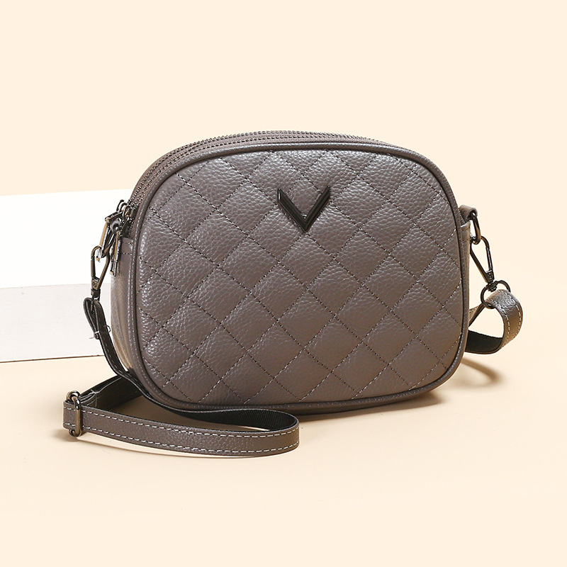 Bolso de mujer de cuero nuevo bolso de hombro de mujer Lingerie simple moda mochila de moda pequeño fabricante de bolso de viento