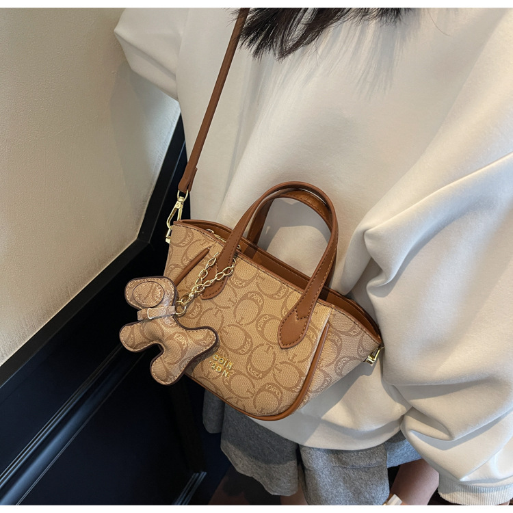 A high-end retro printed bucket bag for summer 2025, a trendy and versatile crossbody bag for women undefined