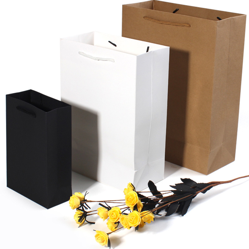 Bolsas de papel kraft gruesas bolsas de mano bolsas de tienda de ropa bolsas personalizadas logotipo vino tinto té bolsas de regalo embalaje de compras