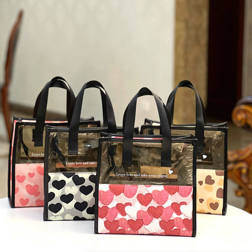 New Korean version of transplanted love translucent portable waterproof cosmetic bag, toiletry bag, portable cosmetic bag, hand bag for women