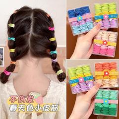 子供は髪を傷つけない赤ちゃんがポニーテールを結んでいる女の子の耐久性の高い弾力ゴムの赤ちゃんのトランペットの髪飾り