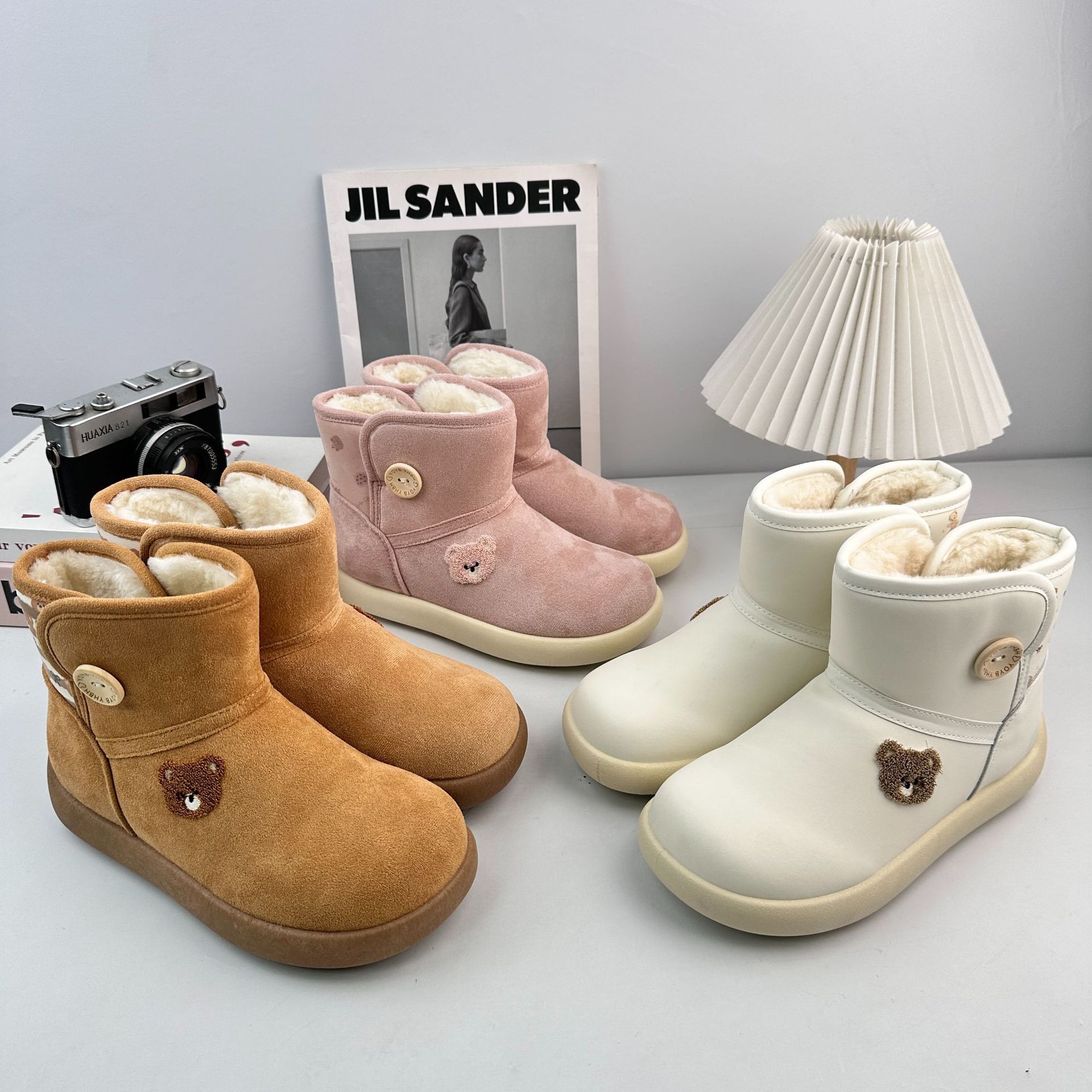 Zapatos de nieve de invierno de larga onda para mujeres 2025 nuevos zapatos de algodón de estilo coreano ligero y cálido con una base plana gruesa