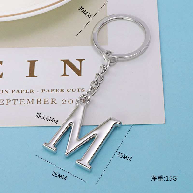Inglés carta llavero bolsa colgante 26 letras mayúsculas y minúsculas y números llavero europeo y americano pequeño regalo personalización