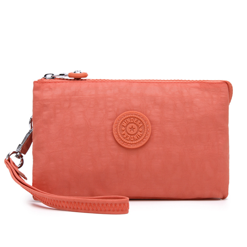 Bolsa de mano de nylon multicapa de gran capacidad a prueba de derrames de agua de mujer simple de moda larga cremallera cambio pasaporte bolso móvil