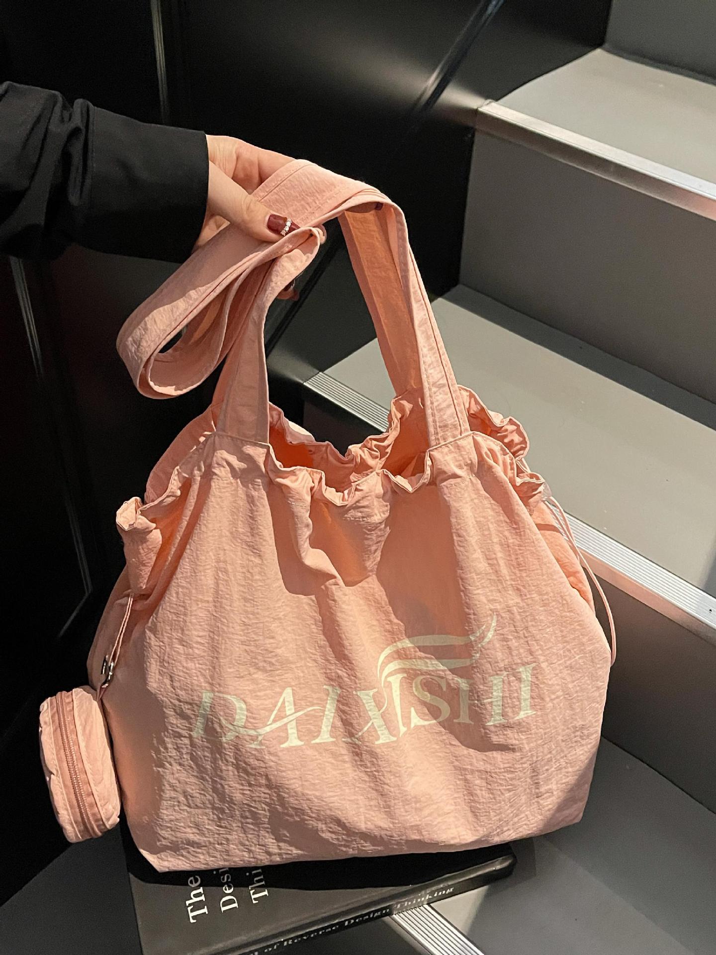 Bolso de estilo perezoso para mujer de gran capacidad 2025 nuevo bolso de lona coreano bolso de mujer de viaje ligero de ocio