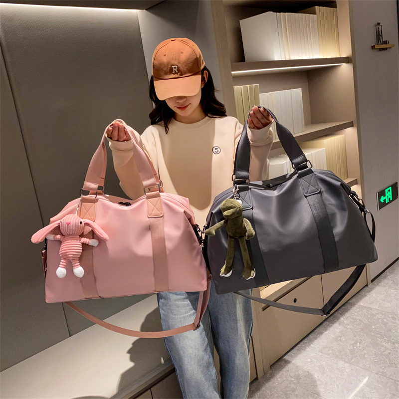 Bolsa de viaje de corta distancia bandolera portátil para mujer estilo coreano bolsa de equipaje de gran capacidad de moda bolsa de viaje para hombres