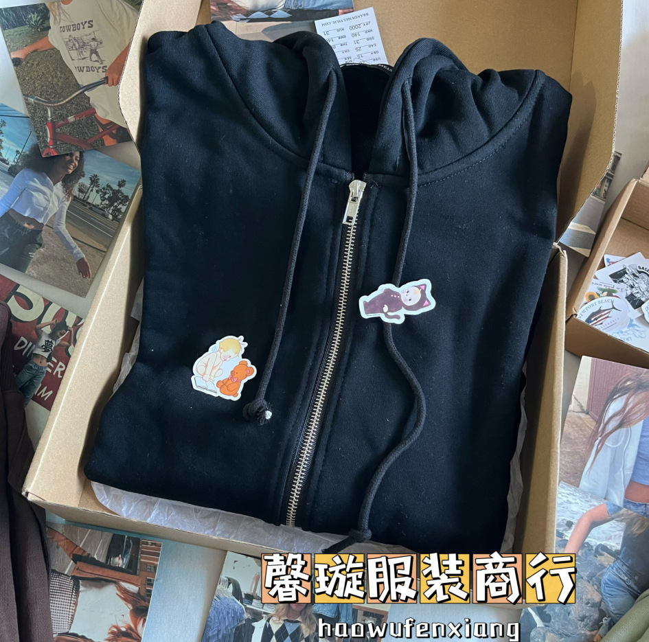 Bm風ブランディ同タイプの女性コートの純色のゆったりしたジッパーと帽子のカーディガン
