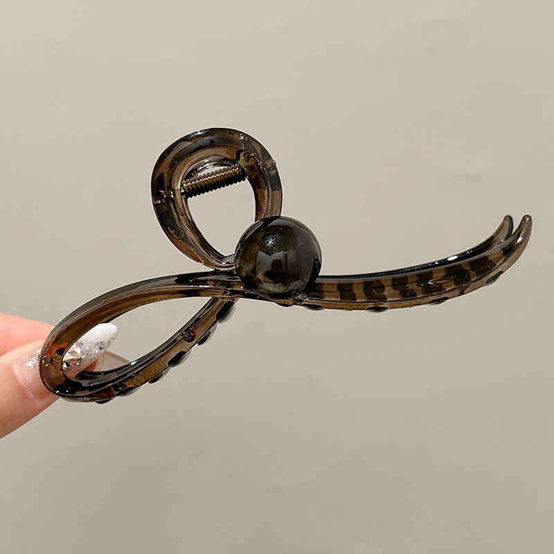 Gran volumen de cabello, horquilla larga, sentido avanzado femenino 2025 nuevo clip de agarre completo, clip de tiburón, tocado, horquilla