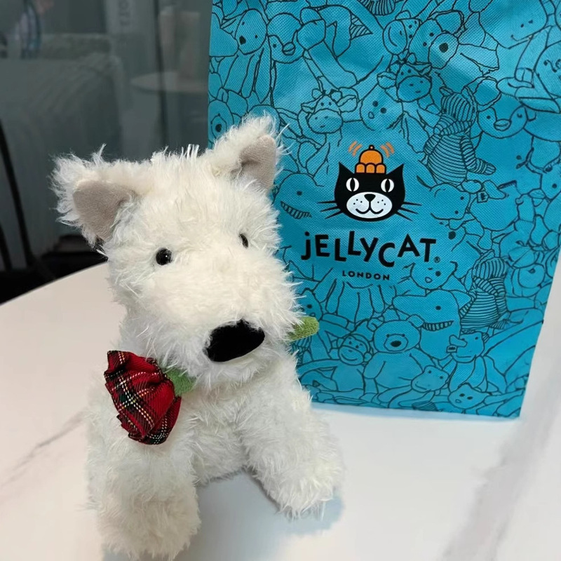 国産ジェリーキャットと同じスタイルの花を抱えたウェストハイランド・テリアのバレンタインデー用のかわいいぬいぐるみ、車の鍵のギフト|undefined