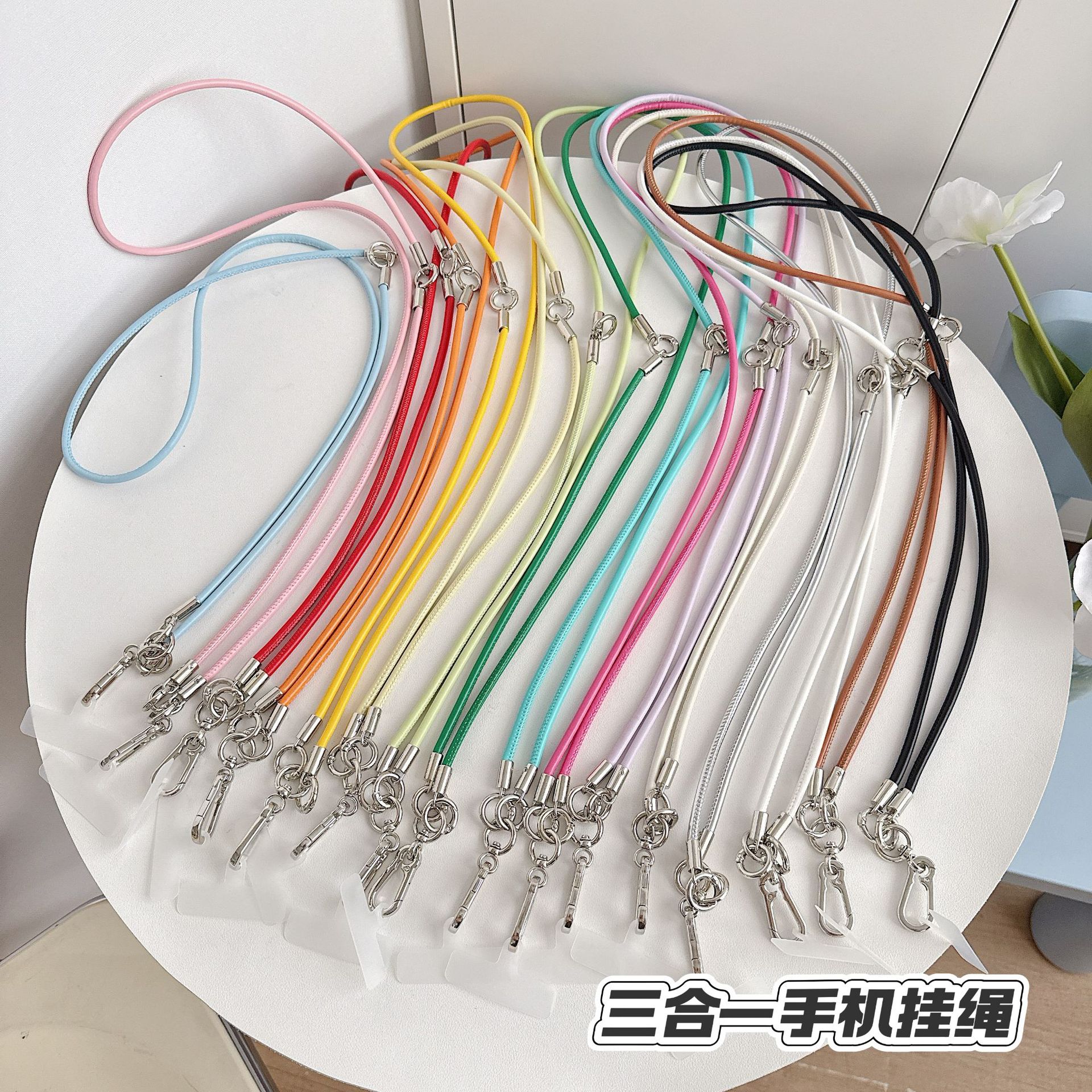 Cordón de teléfono móvil de alta gama hecho a mano boutique Cordón de cuero ins Cadena larga y corta Cordón de teléfono móvil de moda Cordón de mensajero largo y corto