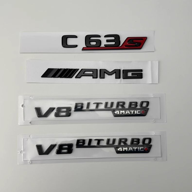 Mercedes-Benz C63S modified with black "Black Warrior" emblems, C260L and C300L modified with V8 BITURO side emblems, and AMG dark night rear emblems