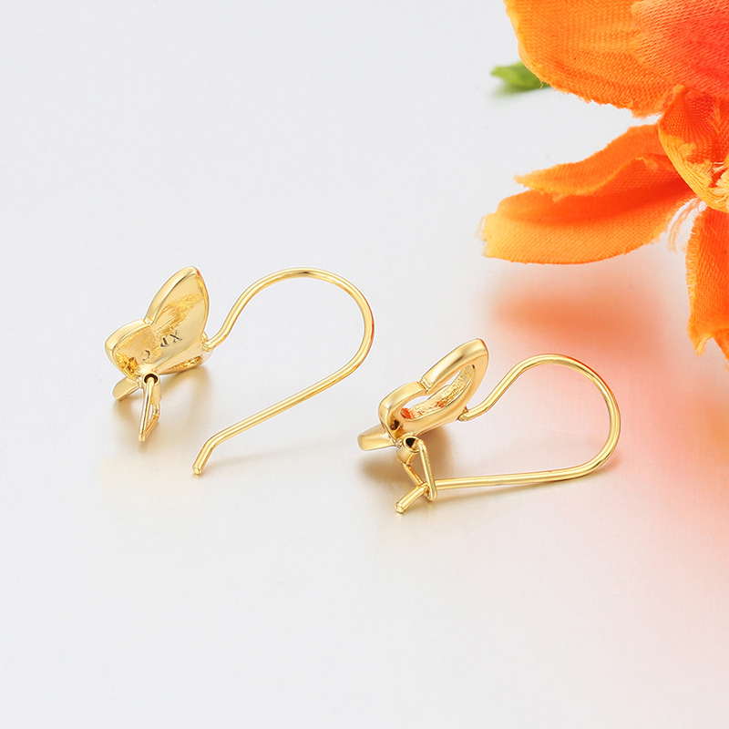 Xuping chapado 14k mariposa gancho de orejas hebilla de aleación de cobre simple Europa y América transfronteriza brillante pendientes de orejas al por mayor mujeres