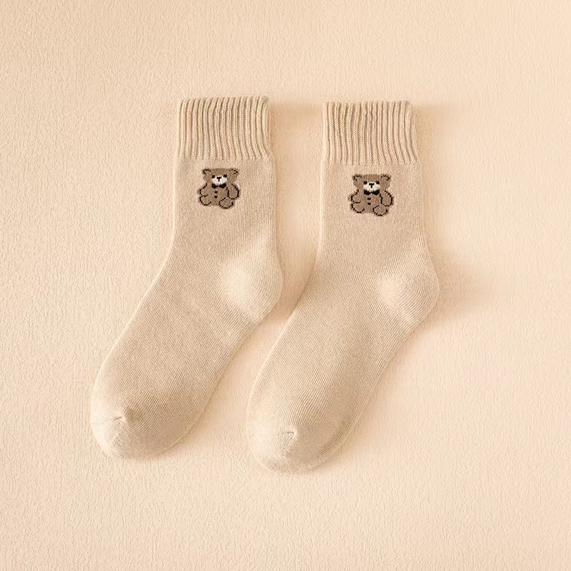 Oso Otoño e Invierno calcetines cálidos al por mayor de las mujeres a media pantorrilla forrada de lana engrosada resistente al frío Terry calcetines toalla Calcetines de piso