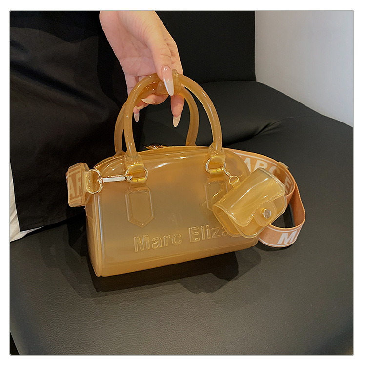 Verano nuevo bolso de almohada portátil de PVC transparente de jalea para mujeres este año popular alta textura mochila de hombro