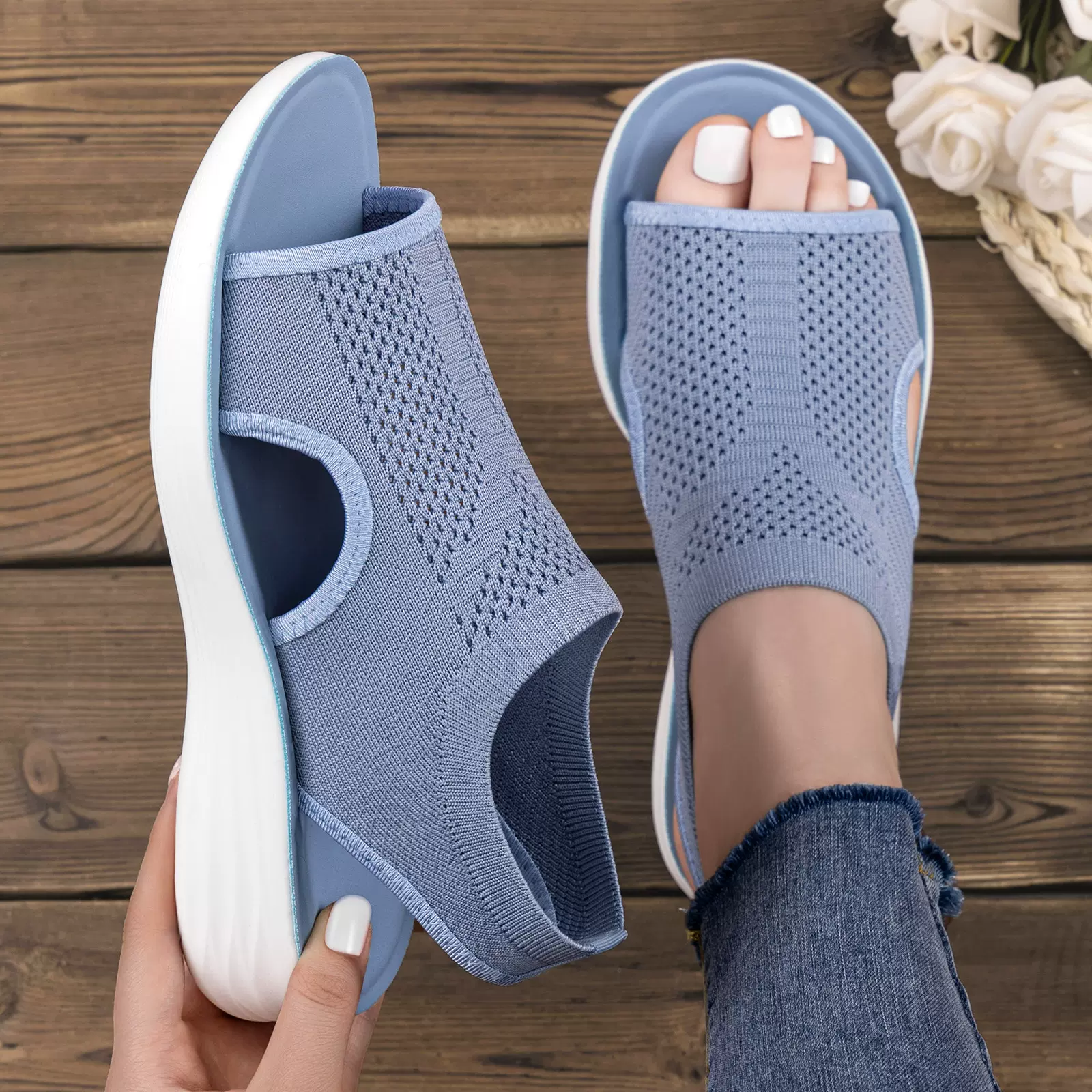 夏季时尚休闲沙滩鞋女士套脚飞织凉鞋平底镂空露趾罗马鞋跨境女鞋