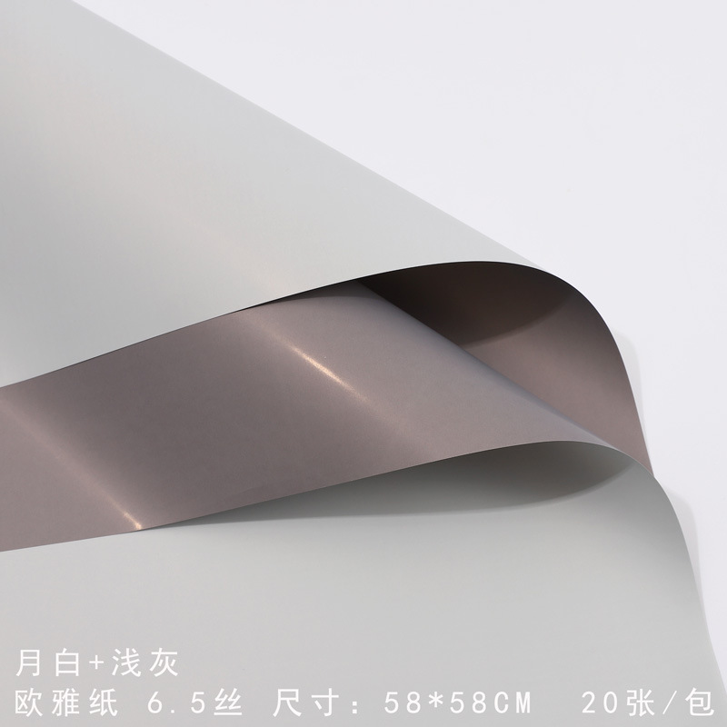 Papel de embalaje de flores de alta calidad al por mayor Papel Ouya impermeable de dos colores al por mayor Fabricante de papel de flores de bolsa de regalo hecho a mano creativo