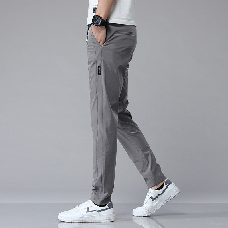 Pantalones casuales de hielo delgados de verano transfronterizos elásticos delgados de hombre 2026 nuevos pantalones deportivos de secado rápido