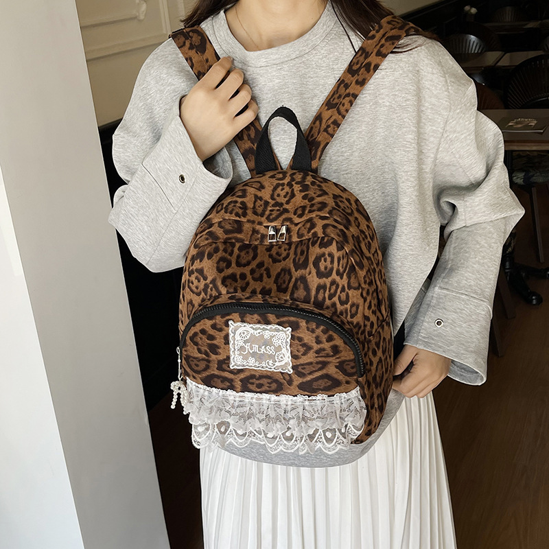 Mochila de moda coreana con patrón de leopardo para niños y niñas, mochila para niños de jardín de infantes, nueva mochila de niños de gran capacidad