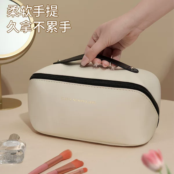 Factory Direct Sales Large Capacity Cosmetics Bag Pu Leather Satchel Travel Satchel 2024 New Pillow Cosmetic Bag