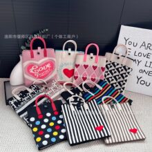 单肩斜跨包女新款小众设计百搭高级感针织编织包手提包手机包方包