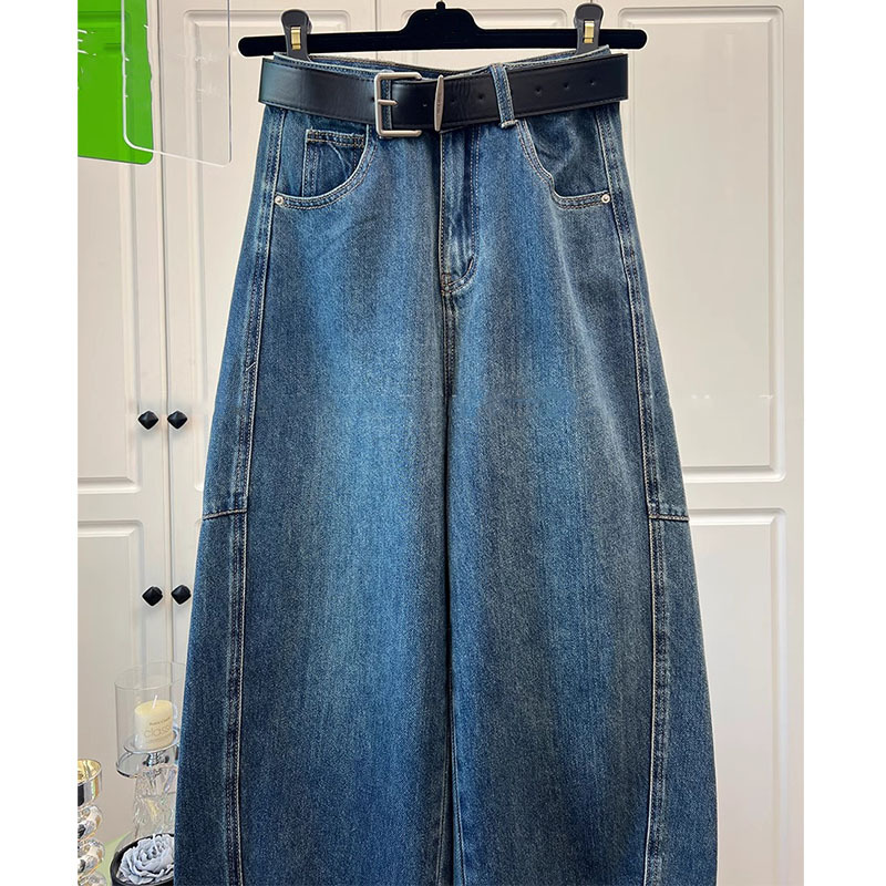 深セン2025の新型の南油の婦人服のヨーロッパの商品のアメリカの復古の水洗いはレジャーの曲がった刀の広い足のジーパンの女性をつなぎ合わせます。