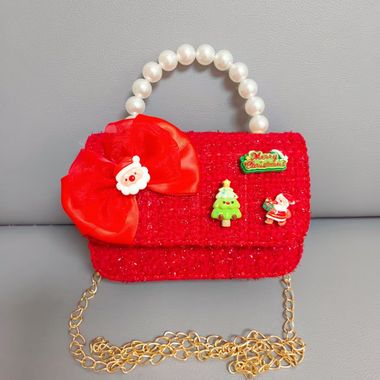 Cartera de Año Nuevo rojo arco de papá Noel bolso de perla pequeña cadena de viento fragante bolso de hombro