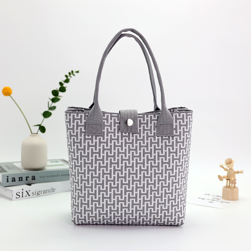 Japón y Corea del Sur tejido bolsas de mano bolsas de viaje de gran capacidad bolsas de compras de chicas fabricantes de bolsas H al por mayor