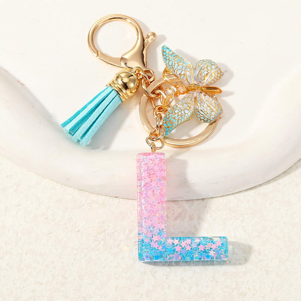 Europa y los Estados Unidos transfronterizos nuevos cristal sequinado goteo de goma letras inglesas joyería llavero y bolsos colgante apoyo al por mayor