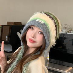 新商品の韓国版秋冬保温ニット帽女性ファッションファッションファッションの色合わせのひもで耳を保護します。