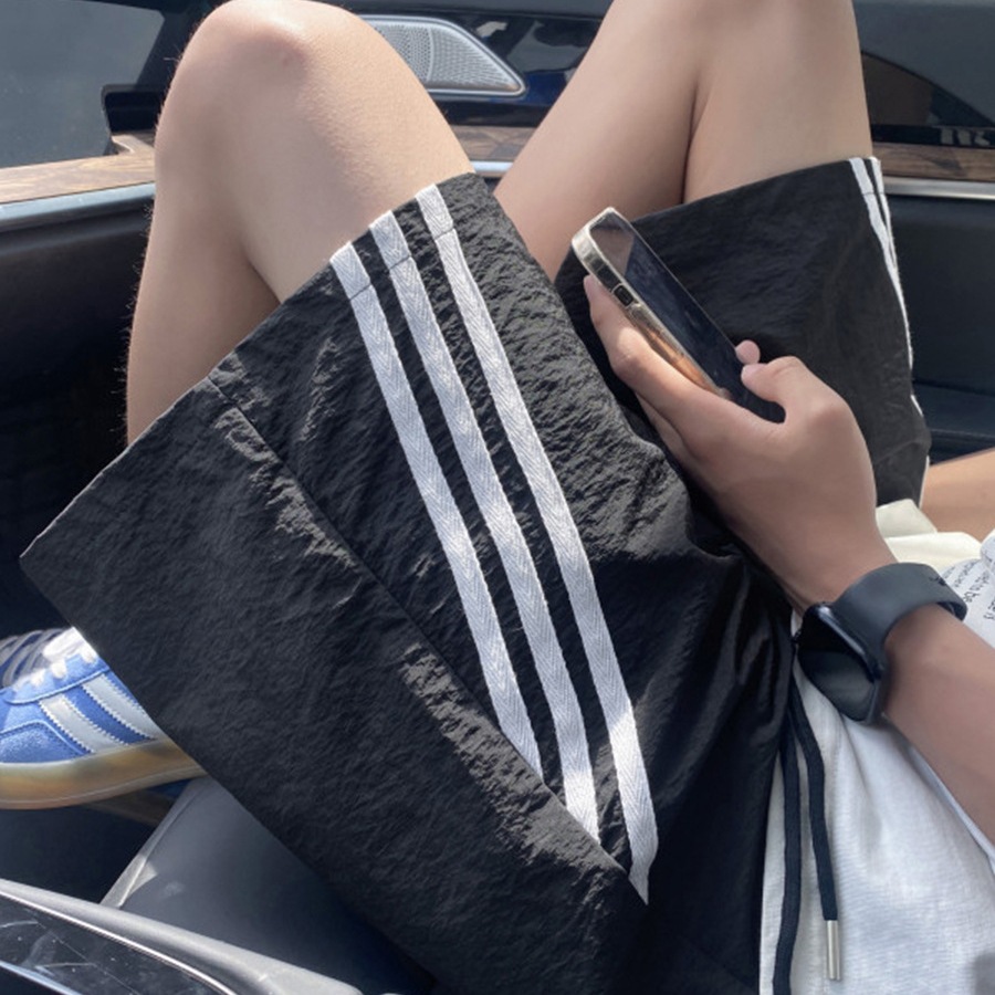 Pantalones cortos de secado rápido de tres barras estadounidenses pantalones finos de cinco puntos rectos transpirables de verano para hombres pantalones de chándal de playa casuales sueltos