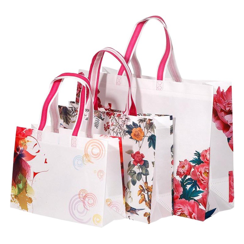 En stock bolsa de tienda de ropa logotipo personalizado bolsa de protección ambiental personalizada bolsa de embalaje de cuatro piezas bolso no tejido recubierto