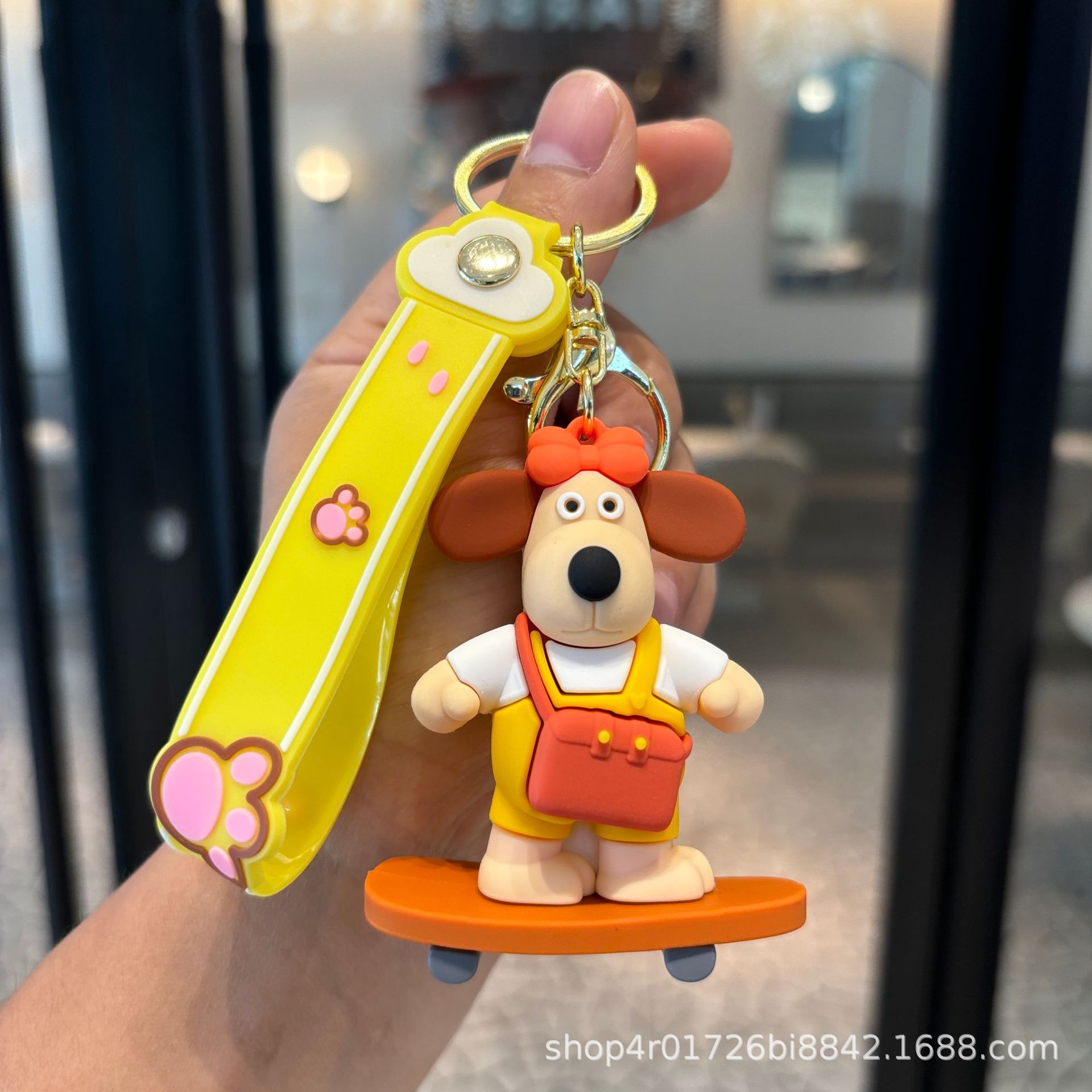 Jefe de perro llavero muñeca colgante llave de PVC pequeño regalo dibujos animados adornos lindos llavero de la máquina