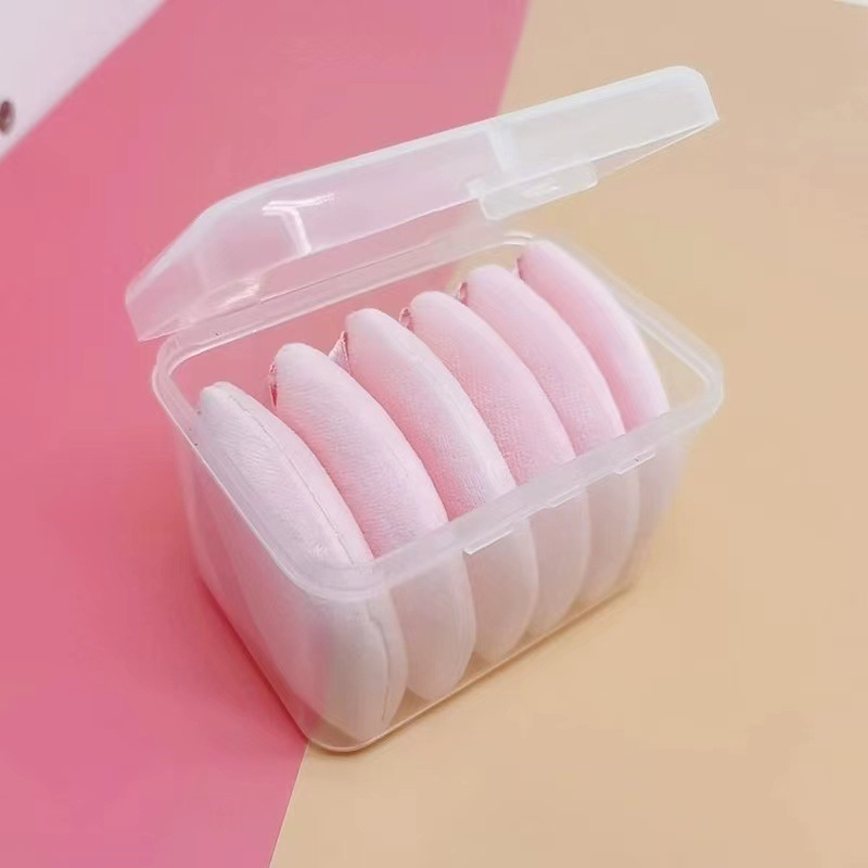 Nuevo triángulo negro soplo de polvo seco en forma de abanico de soplo de maquillaje soplo de polvo de miel mojado y seco herramientas de maquillaje de doble uso transfronterizo exclusivo