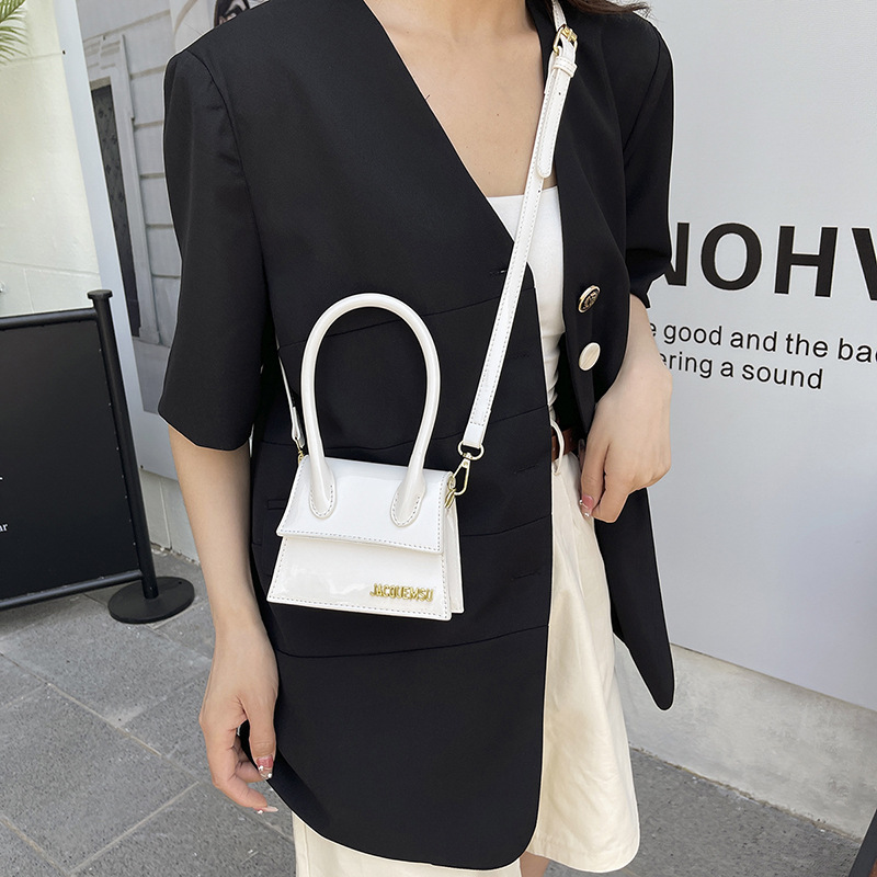 Bolso de alta calidad con textura 2025 verano nuevo bolso de mujer charol brillante bandolera mini letra bandolera marea