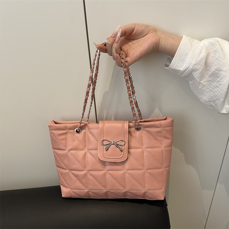 Bolso de hombro de cadena de moda con lazo de gran capacidad para el trabajo para mujer 2025 verano nuevo bolso de nicho