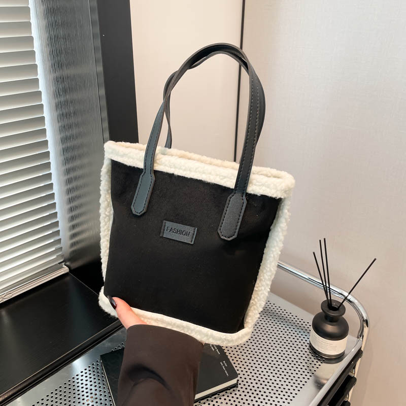 Personalidad de la moda de la axila bolso de cubo de invierno 2024 nuevo estilo casual estilo exterior simple retro hombro bolso de viaje portátil