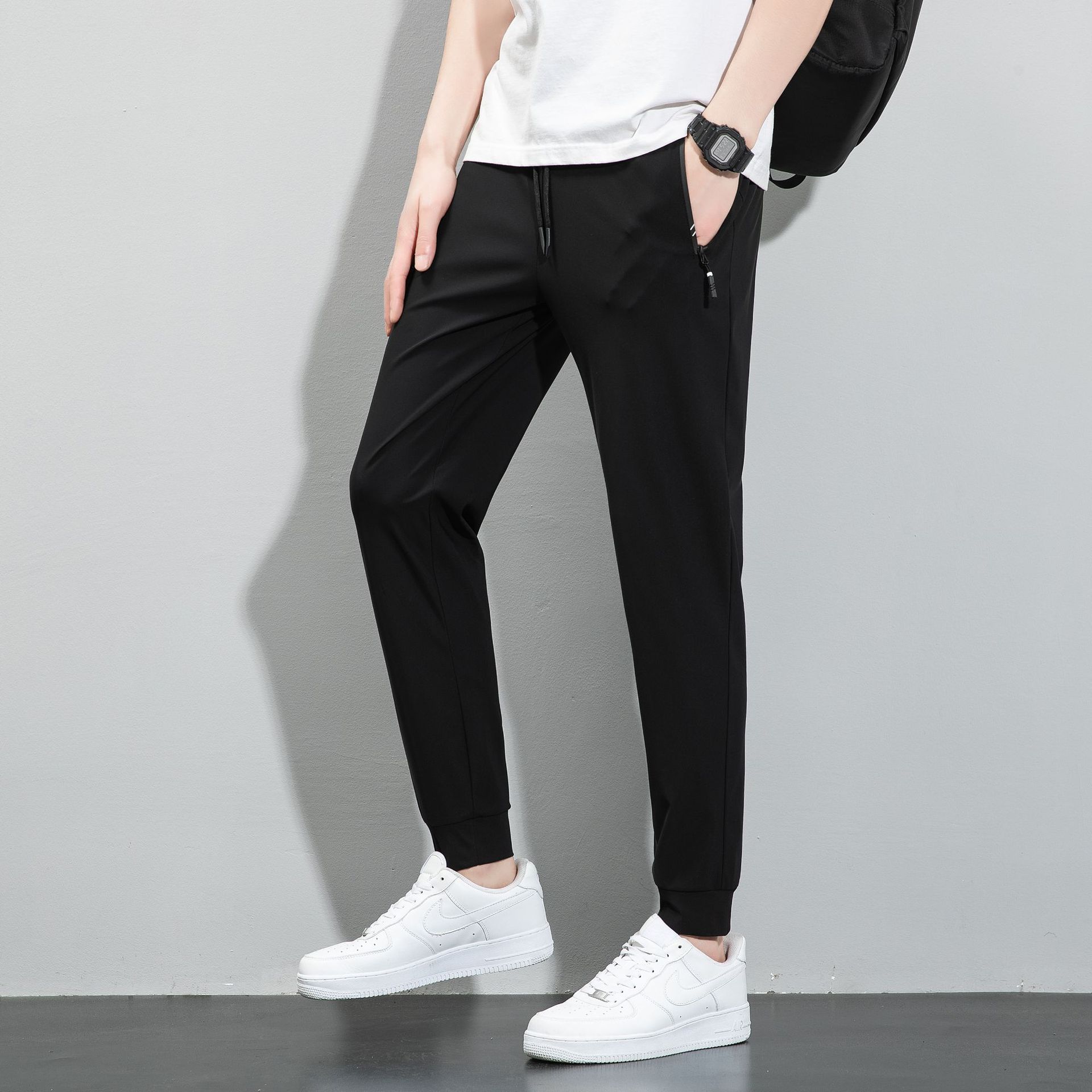 Pantalones de verano de hielo de tamaño grande para hombres pantalones deportivos de barril recto, piernas de ángulo plano sin quemar, secado rápido pantalones casuales al por mayor