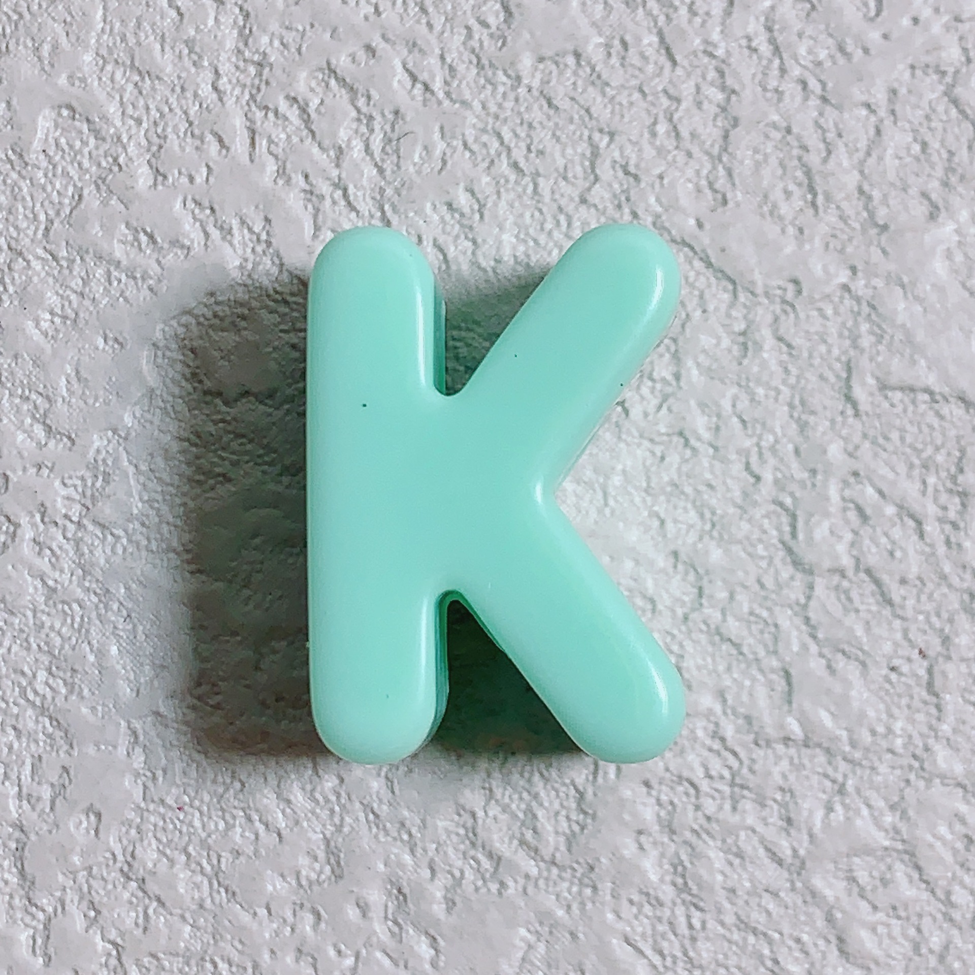 K (turquoise)