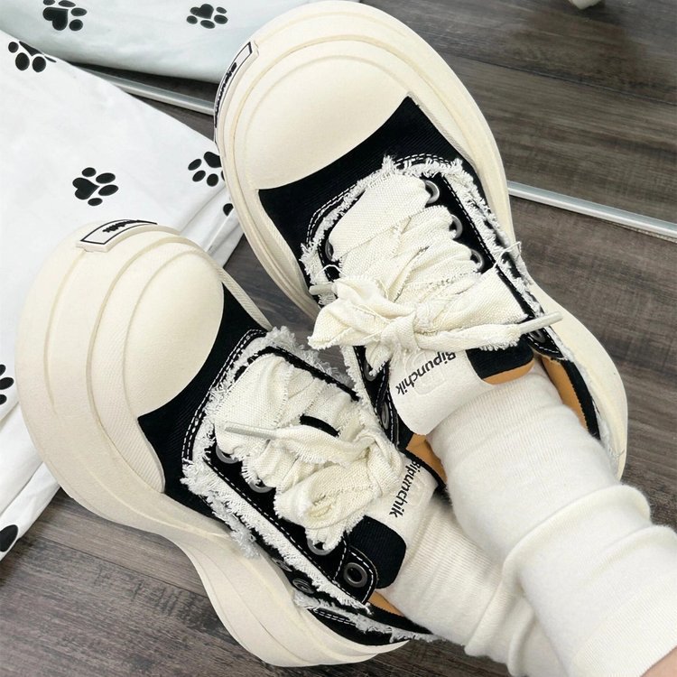 Zapatos de lona de vendaje negro y blanco pareja zapatos de cabeza grande de moda nacional de suela gruesa de moda masculina y femenina retro versátil zapatos de skate de altura