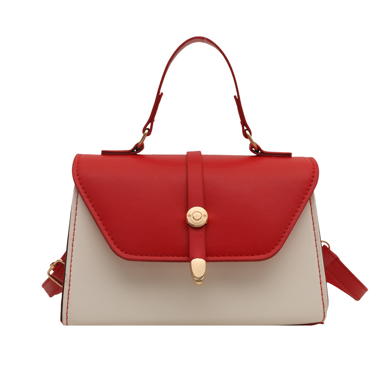 Bolsa de mano de textura de empalme retro para mujeres 2025 nuevo estilo simple y casual de moda extranjera bolso de hombro