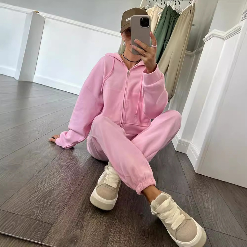 アマゾンのクロスボーダーのカジュアル欧米の女性のスーツの純色の長袖のファスナーと帽子のシャツのゴムのひものズボンの2つのセット|undefined
