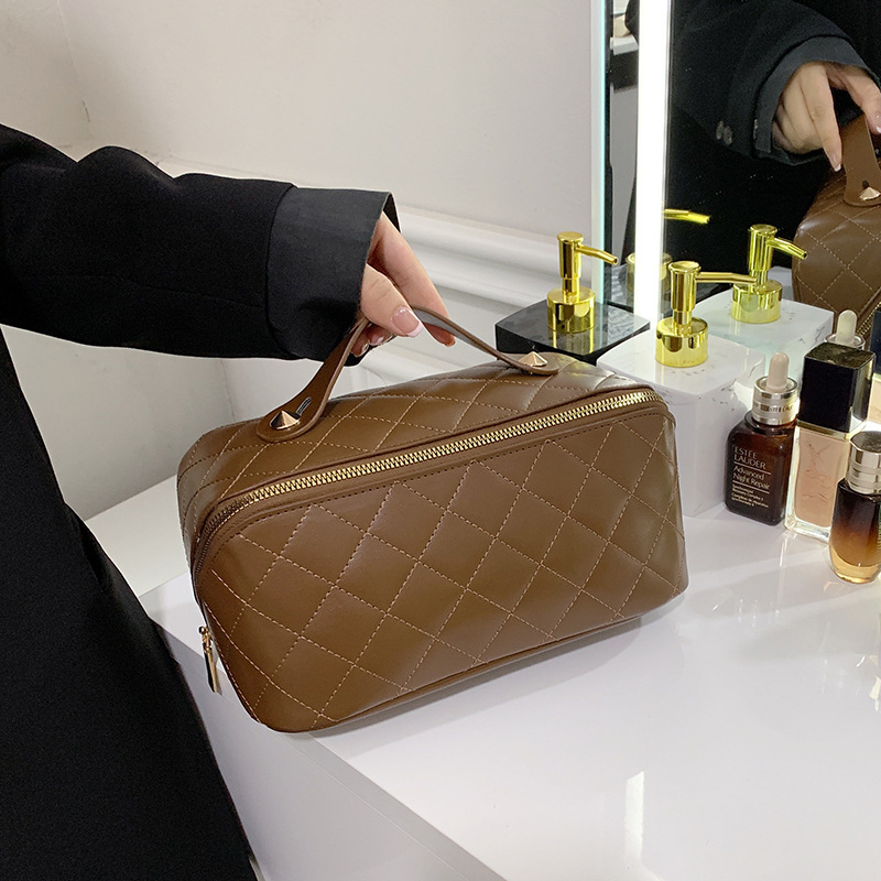 Bolsa de cosméticos con diseño de diamantes, almacenamiento portátil para viajes, bolsa de gran capacidad para artículos de tocador y cosméticos para mujer.