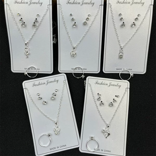 New 3 pairs earrings ring necklace suit girl student clavicle chain small gift 2 yuan store supply