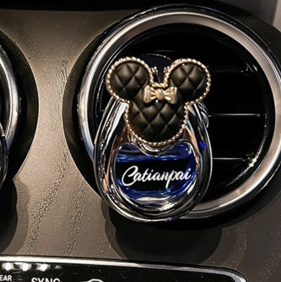 Perfumes de automóviles, salidas de aire, adornos de automóviles