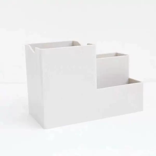 White coloured pencils, pens holder